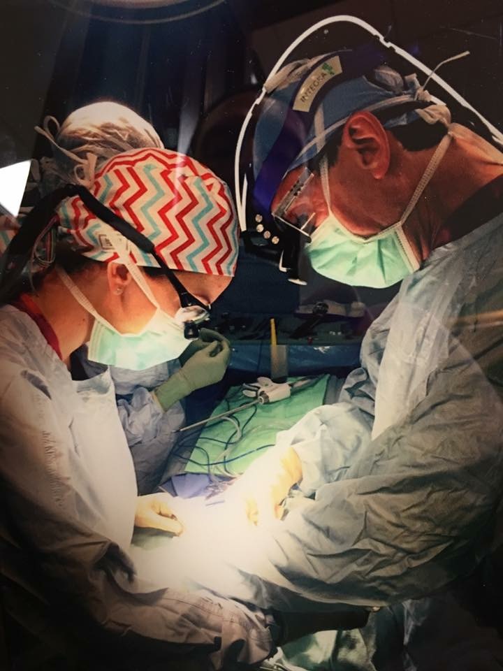 Dr Gary Clayman in the operating room doing a thyroid surgery.